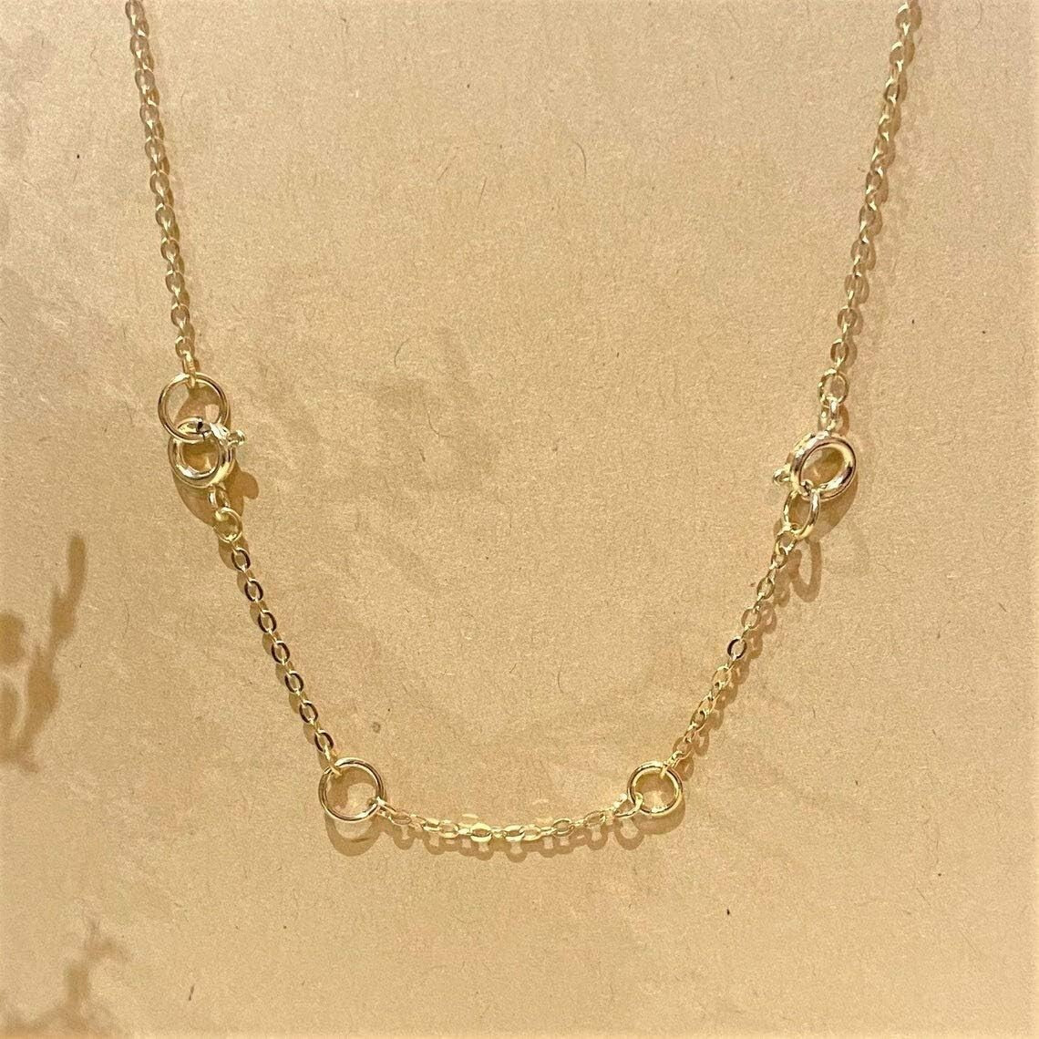 14K Gold Adjustable Necklace Extender 2-4 Inch for Elegant Jewelry Versatility