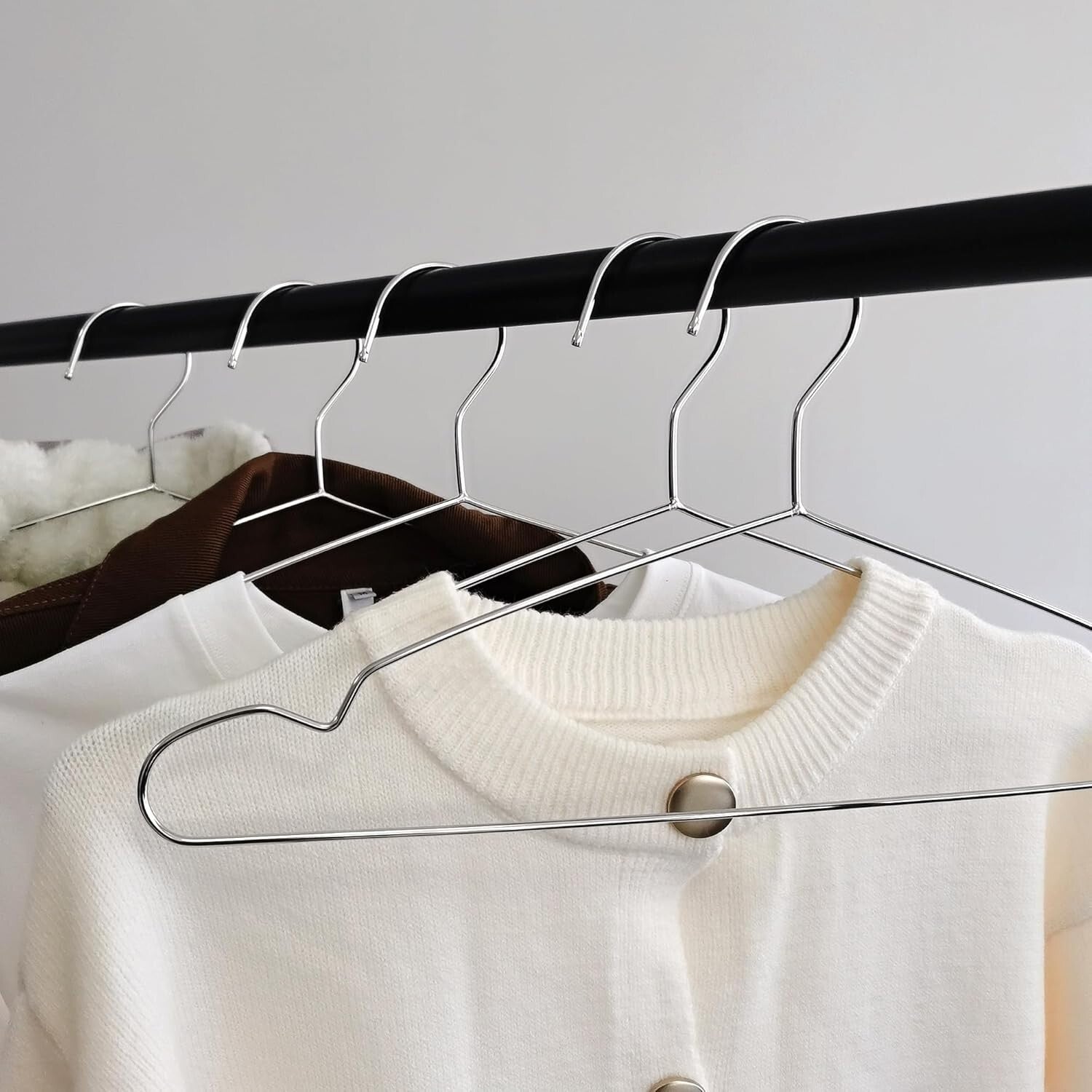 Triangular 100 Pack Closet Hangers - V-Groove Design for Optimal Garment Hanging