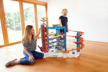 Load image into Gallery viewer, Super Ultimate Garage Toy Car Track Set – 3+ ft Tall Playset &amp; 4 Cars Included