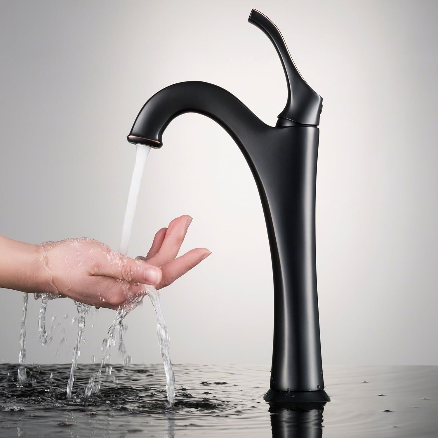 Arlo Oil Rubbed Bronze Single Handle Vessel Faucet with Pop-Up Drain Included