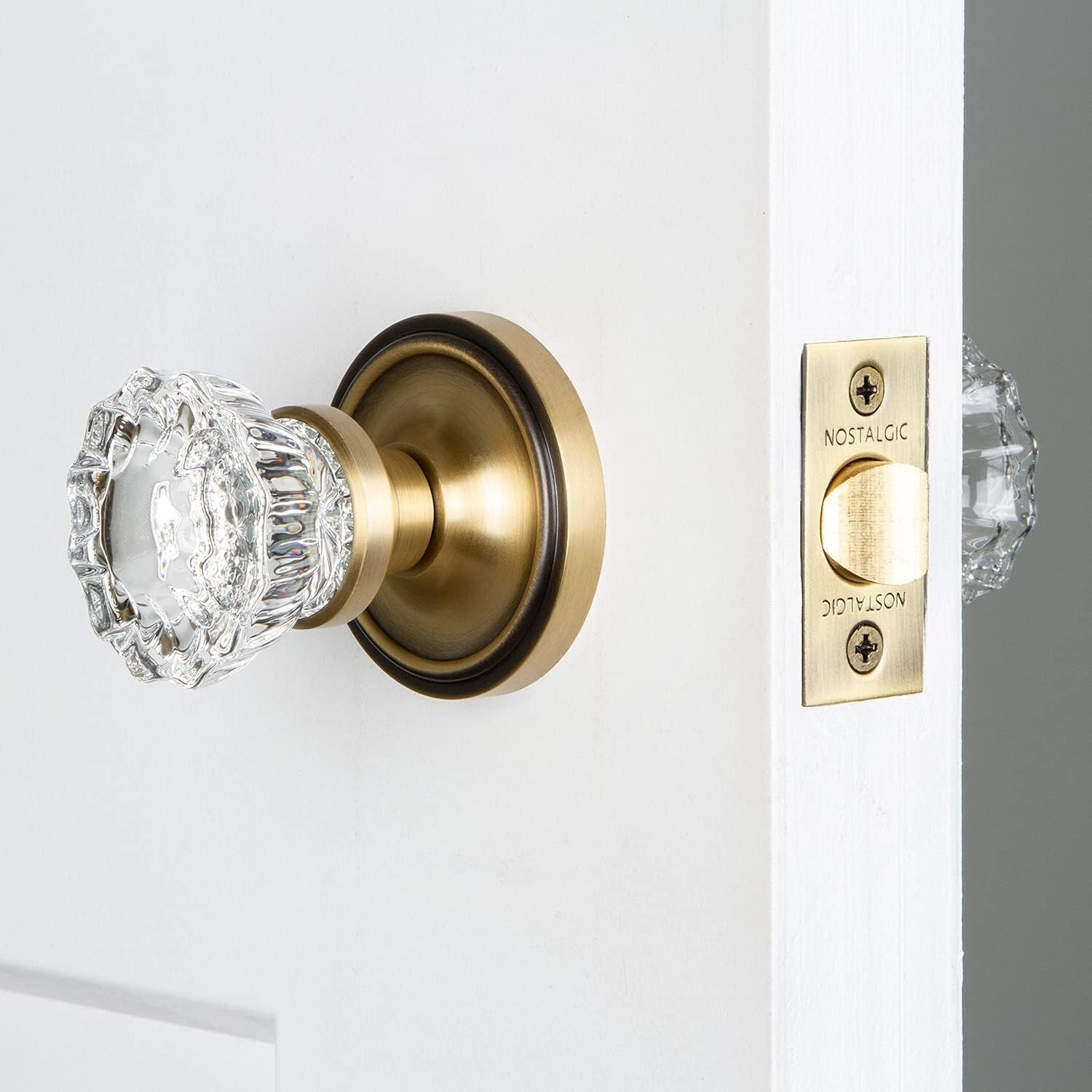 Sophisticated Antique Brass Rosette Door Knob with Pristine Crystal Handle