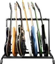 Load image into Gallery viewer, Compact Folding Guitar Stand for 7 Instrument Storage - Ideal for Travel