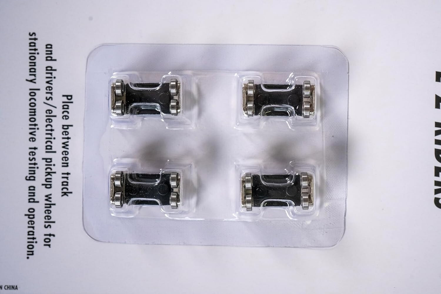 4-Pack HO/On30 E-Z Riders with Ball Bearing Rollers for Test Running Locomotives