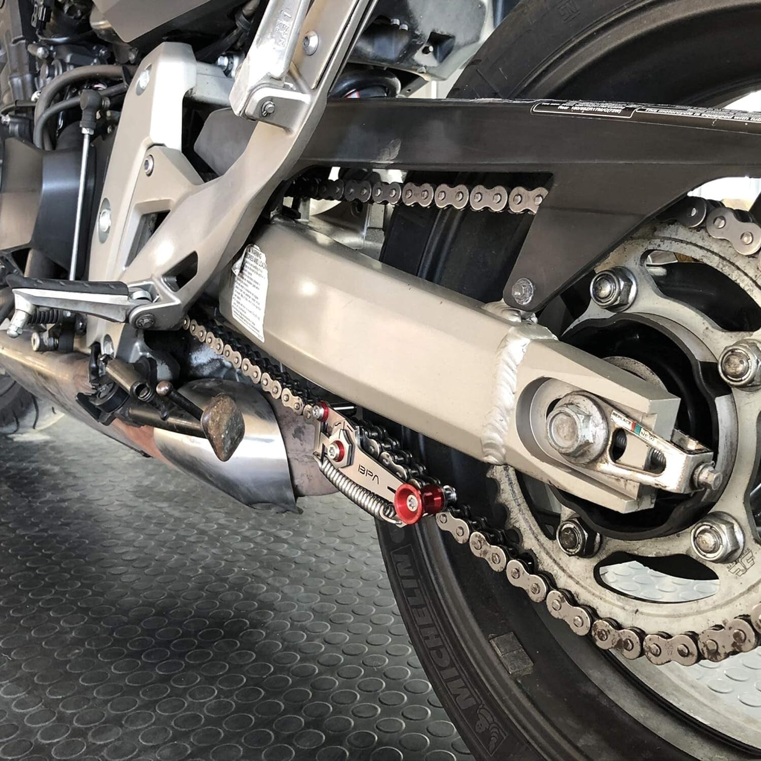 Patented Motorcycle Chain Slack Adjuster Tool for Quick and Precise Tensioning