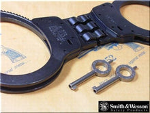 Load image into Gallery viewer, Compact and Lightweight Blue Hinged Handcuffs for Easy Carry in Law Enforcement