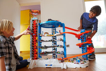 Load image into Gallery viewer, Super Ultimate Garage Toy Car Track Set – 3+ ft Tall Playset &amp; 4 Cars Included