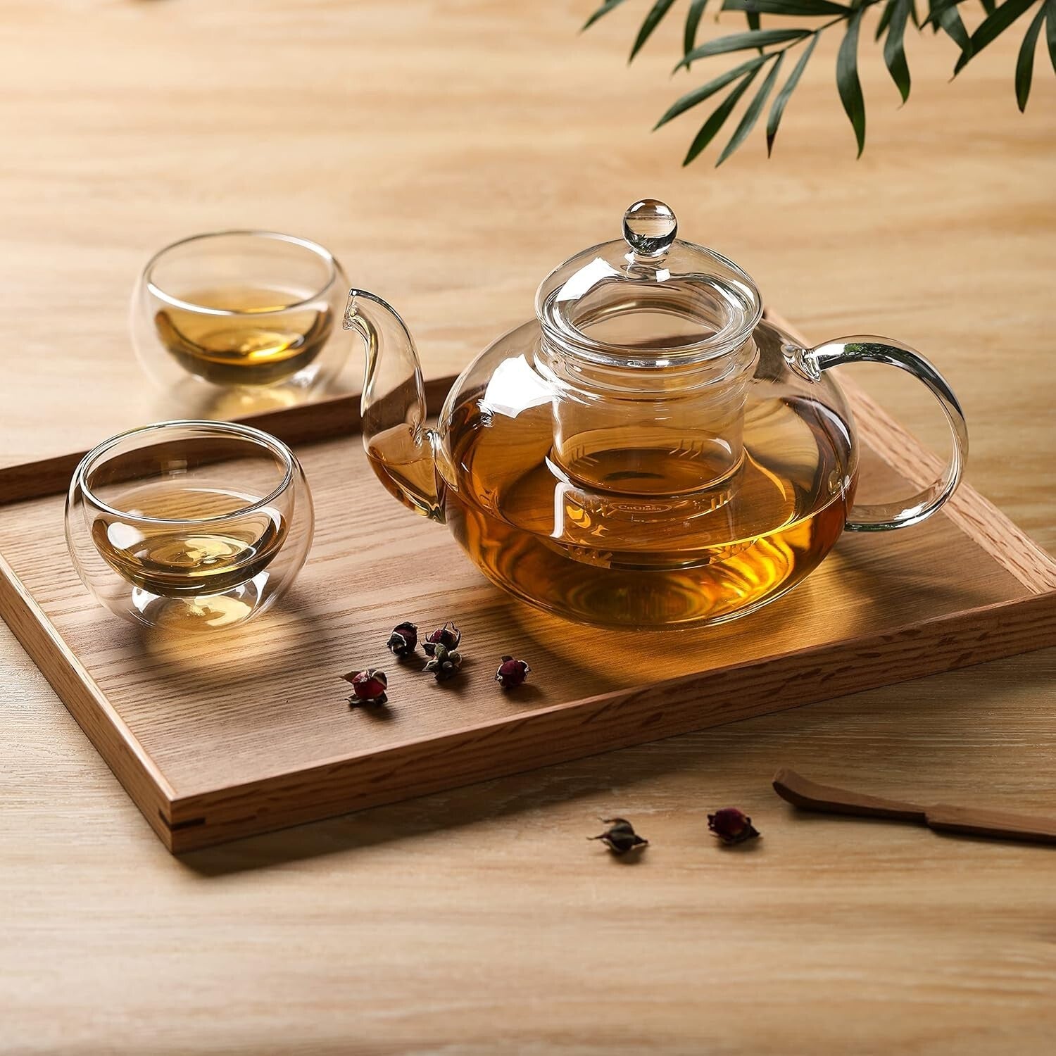 Brewing Delight: 33.8oz Glass Teapot with Removable Infuser + 4 Teacups