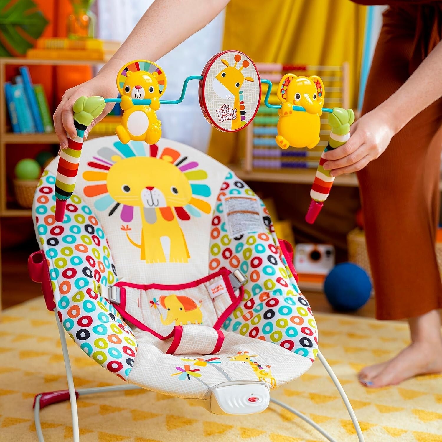 Portable Baby Bouncer with Soothing Vibrations & Toy Bar - Playful Pinwheels