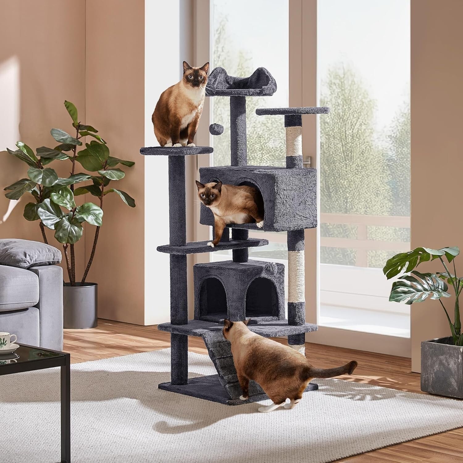 Durable 54-Inch Cat Tower with Plush Hideaways and Interactive Dangling Balls
