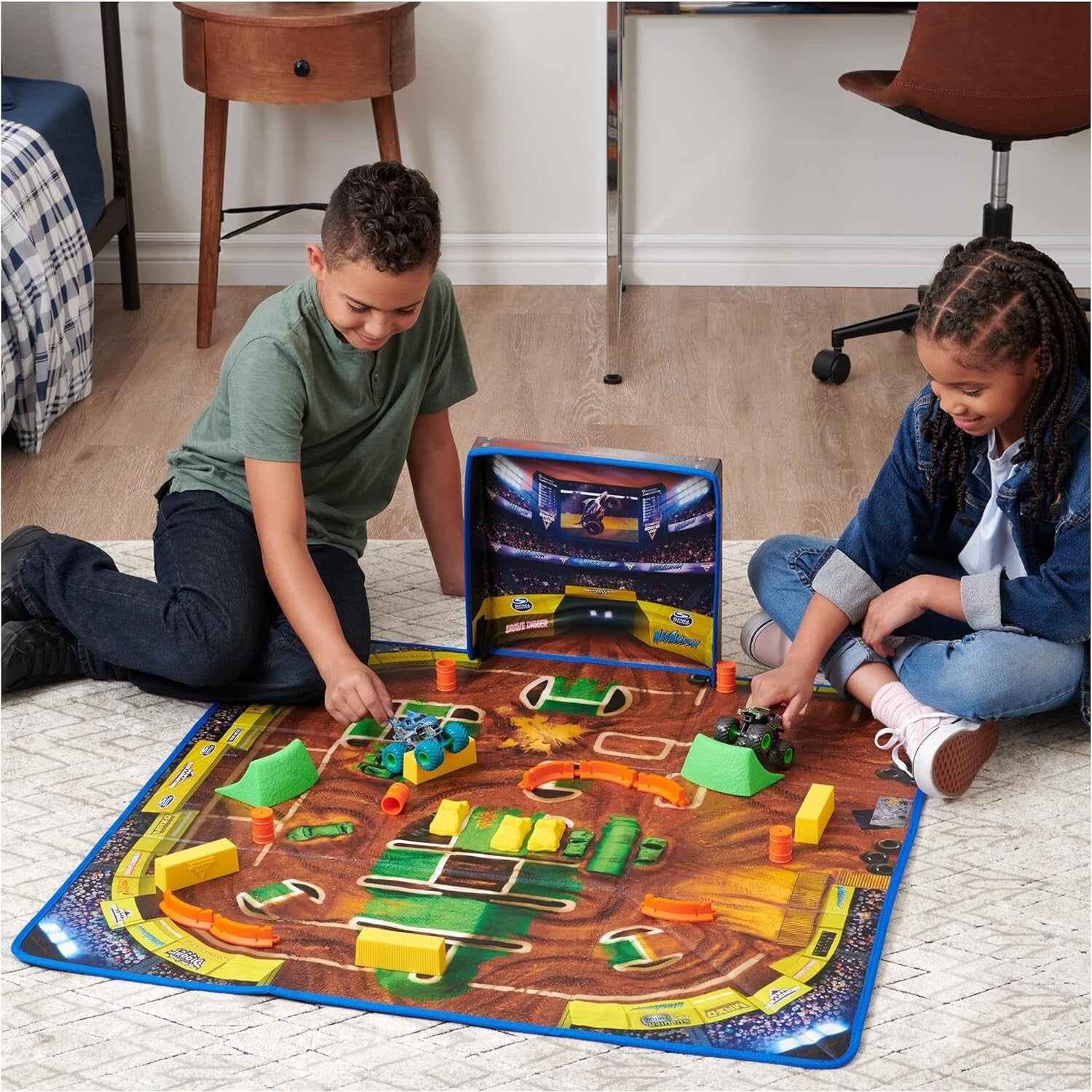Deluxe Monster Truck Arena Playmat with 2 Exclusive Trucks & 20 Fun Pieces