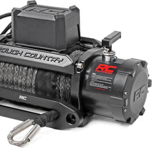 Load image into Gallery viewer, 12V Electric Winch with 12,000 LB Capacity &amp; Wireless Control for Off-Road Use